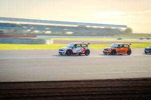 Sunset Racing with the race pack behind 